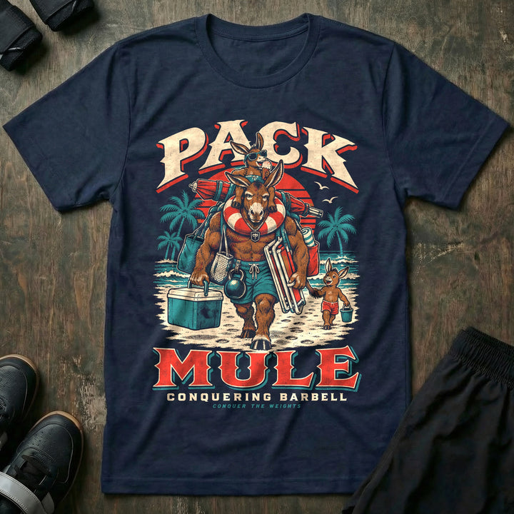 Pack Mule - Tee front graphic in Navy with a mule dad carrying a cooler, beach chairs, bags and a kettlebell on a beach with one young mule on his shoulders and another beside him - Conquering Barbell