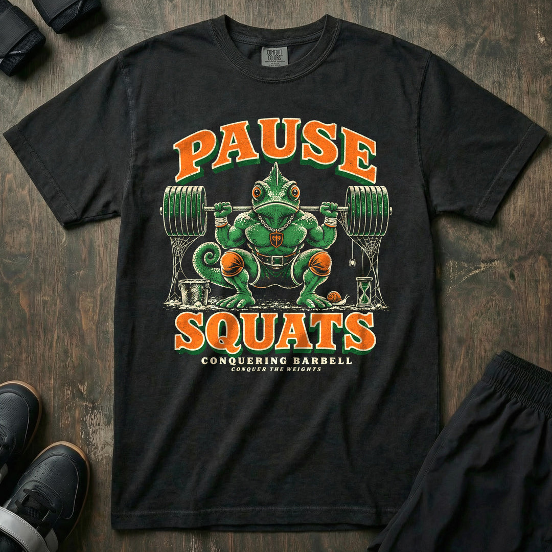 Pause Squats - Relaxed Fit Tee front graphic in Black with a chameleon paused in the bottom of a squat with cobwebs hanging from the barbell - Conquering Barbell