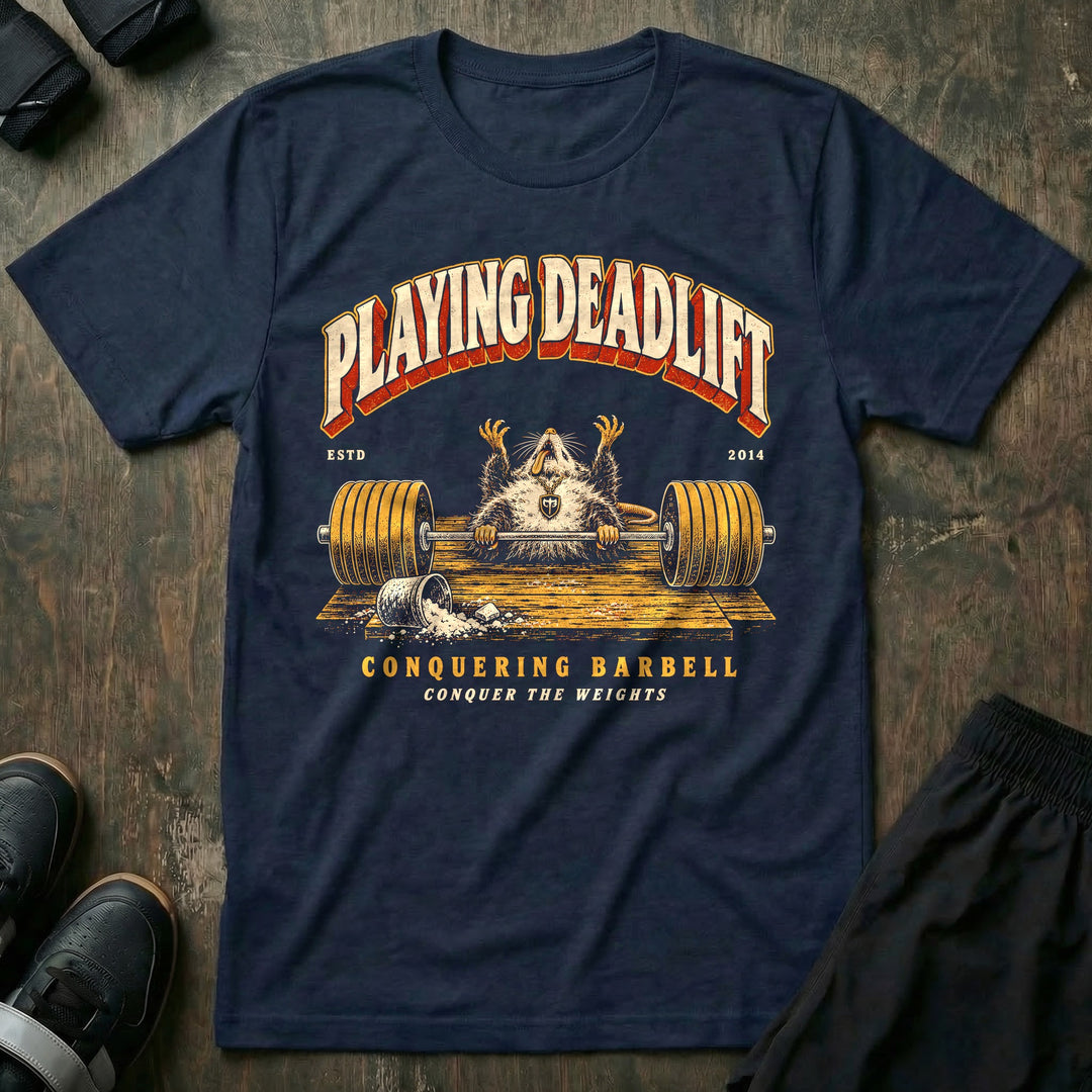 Playing Deadlift - Tee front graphic in Navy with an opossum playing dead on the platform behind a loaded barbell - Conquering Barbell
