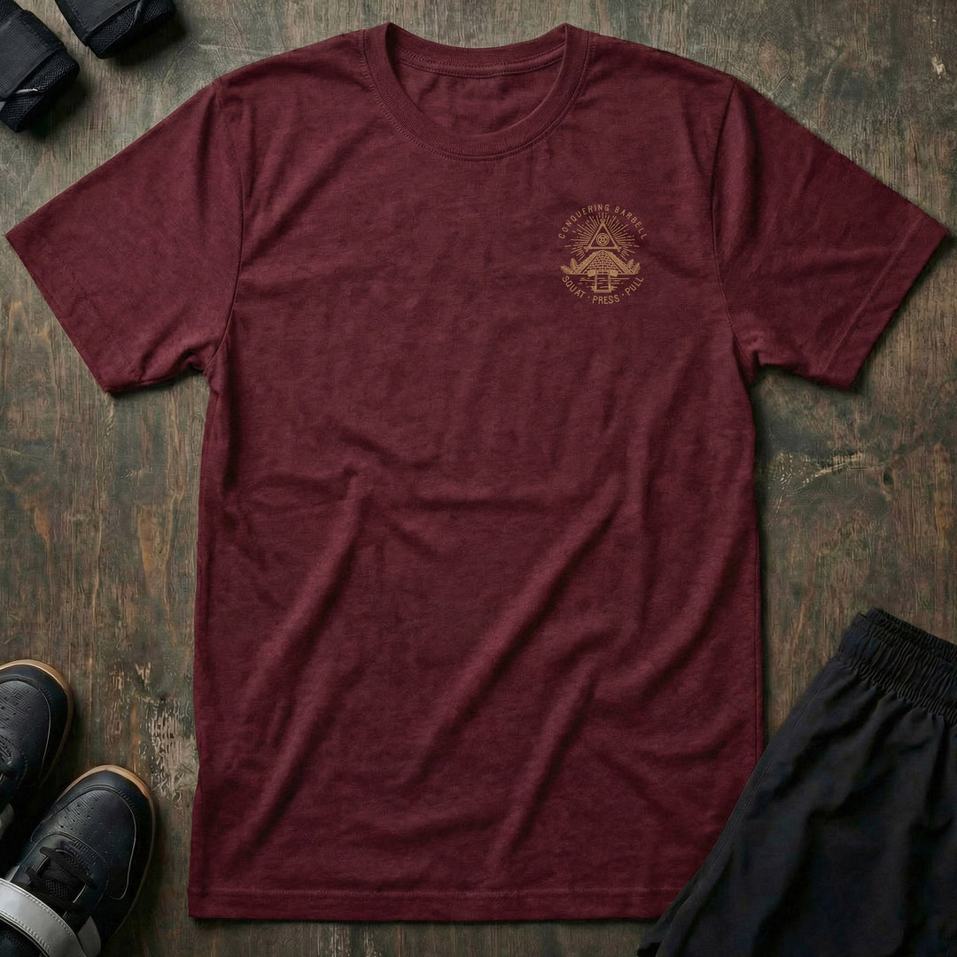 Powerluminati The All Seeing Barbell tee in Maroon: an all-seeing eye pyramid built on a barbell in gold ink across the back