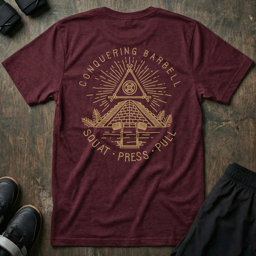 Powerluminati The All Seeing Barbell tee in Maroon: an all-seeing eye pyramid built on a barbell in gold ink across the back
