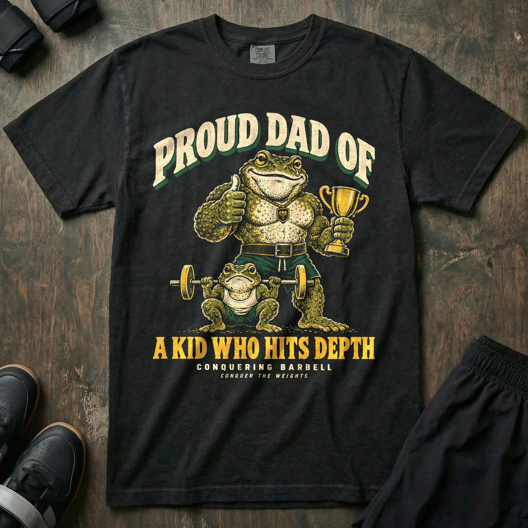 Proud Dad of a Kid Who Hits Depth - Relaxed Fit Tee front graphic in Black with a toad dad with a trophy giving a thumbs up while a small toad squats deep with a barbell - Conquering Barbell