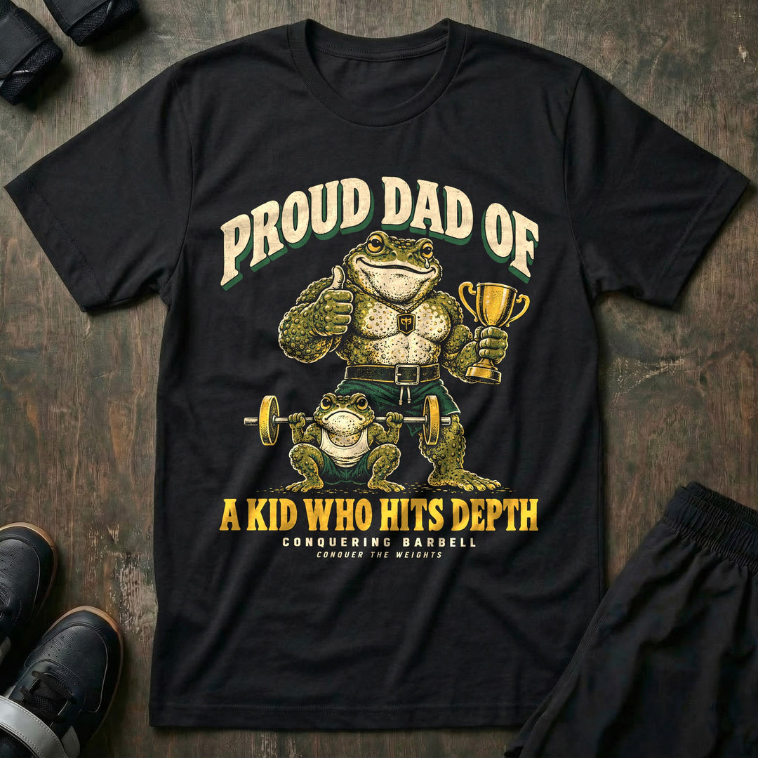 Proud Dad of a Kid Who Hits Depth - Tee front graphic in Black with a toad dad with a trophy giving a thumbs up while a small toad squats deep with a barbell - Conquering Barbell