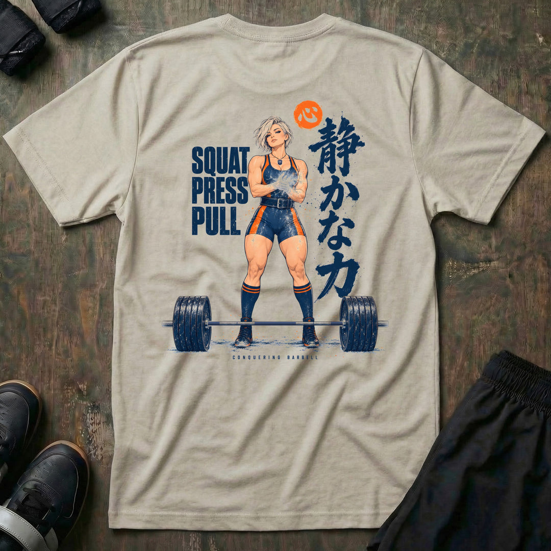 Quiet Power tee in Sand: an anime lifter chalking up behind a loaded deadlift bar with SQUAT PRESS PULL