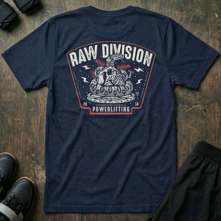 Raw Division tee in Navy: a coiled rattlesnake wrapped around a skull on a stack of weight plates inside a bold badge