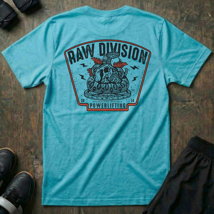 Raw Division tee in Tahiti: a coiled rattlesnake wrapped around a skull on a stack of weight plates inside a bold badge