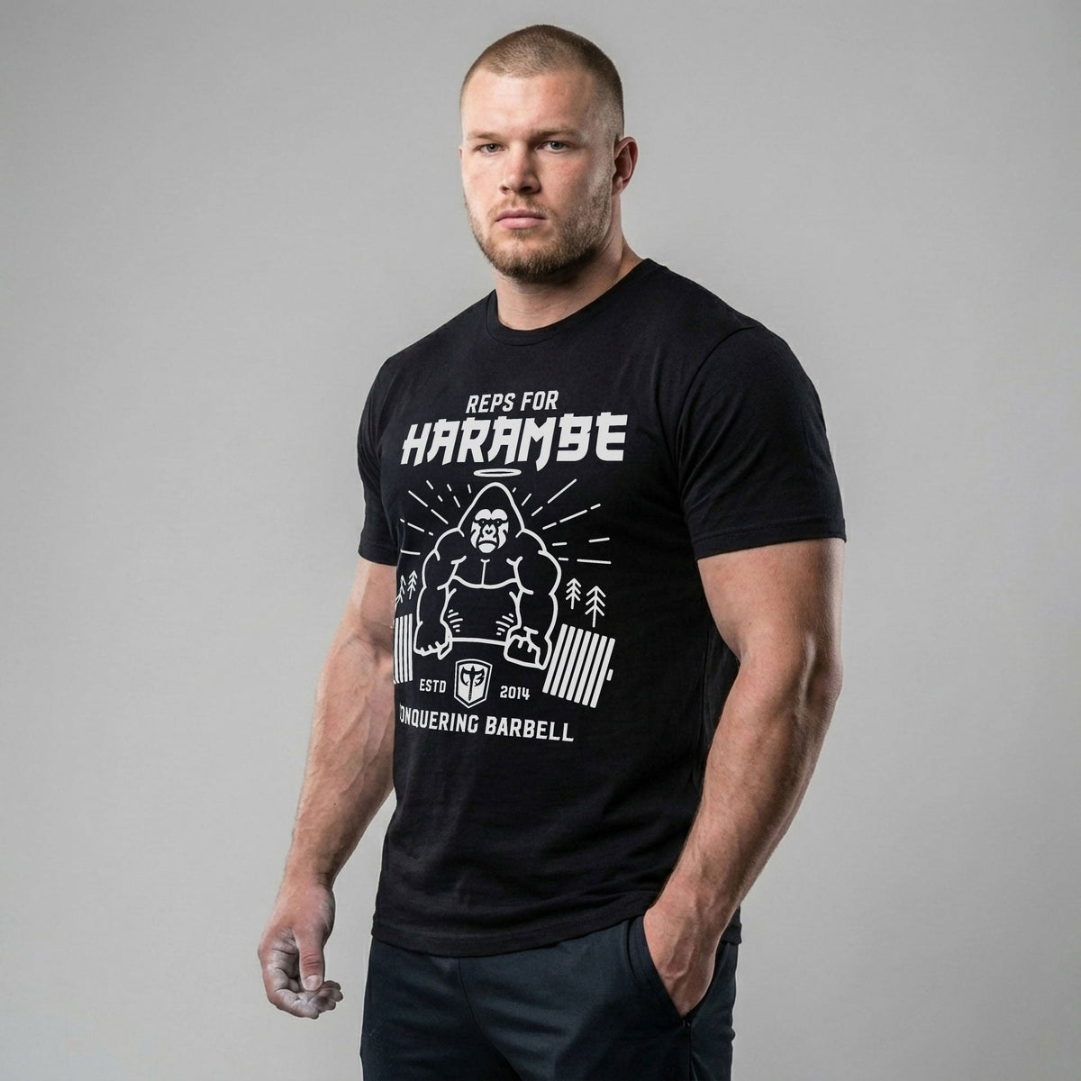 Reps for Harambe tee in Black: a white gorilla with a halo locking out a loaded barbell between pine trees