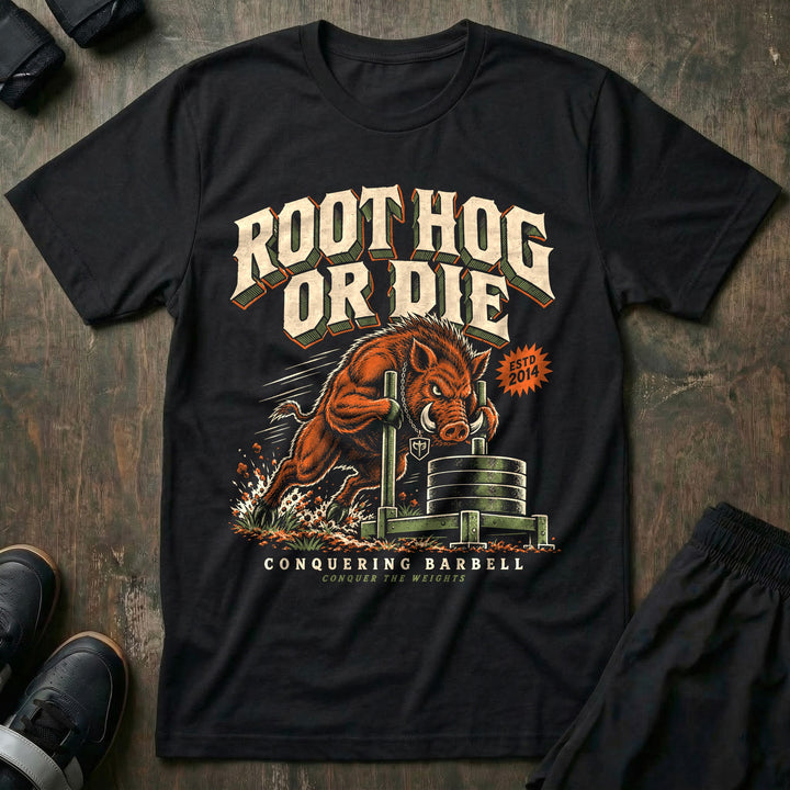 Root Hog or Die - Tee front graphic in Black with a wild boar pushing a prowler sled loaded with weight plates - Conquering Barbell