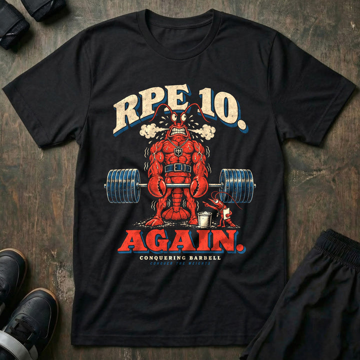 RPE 10 Again - Tee front graphic in Black with a steaming red lobster at deadlift lockout while a shrimp coach points at a clipboard - Conquering Barbell