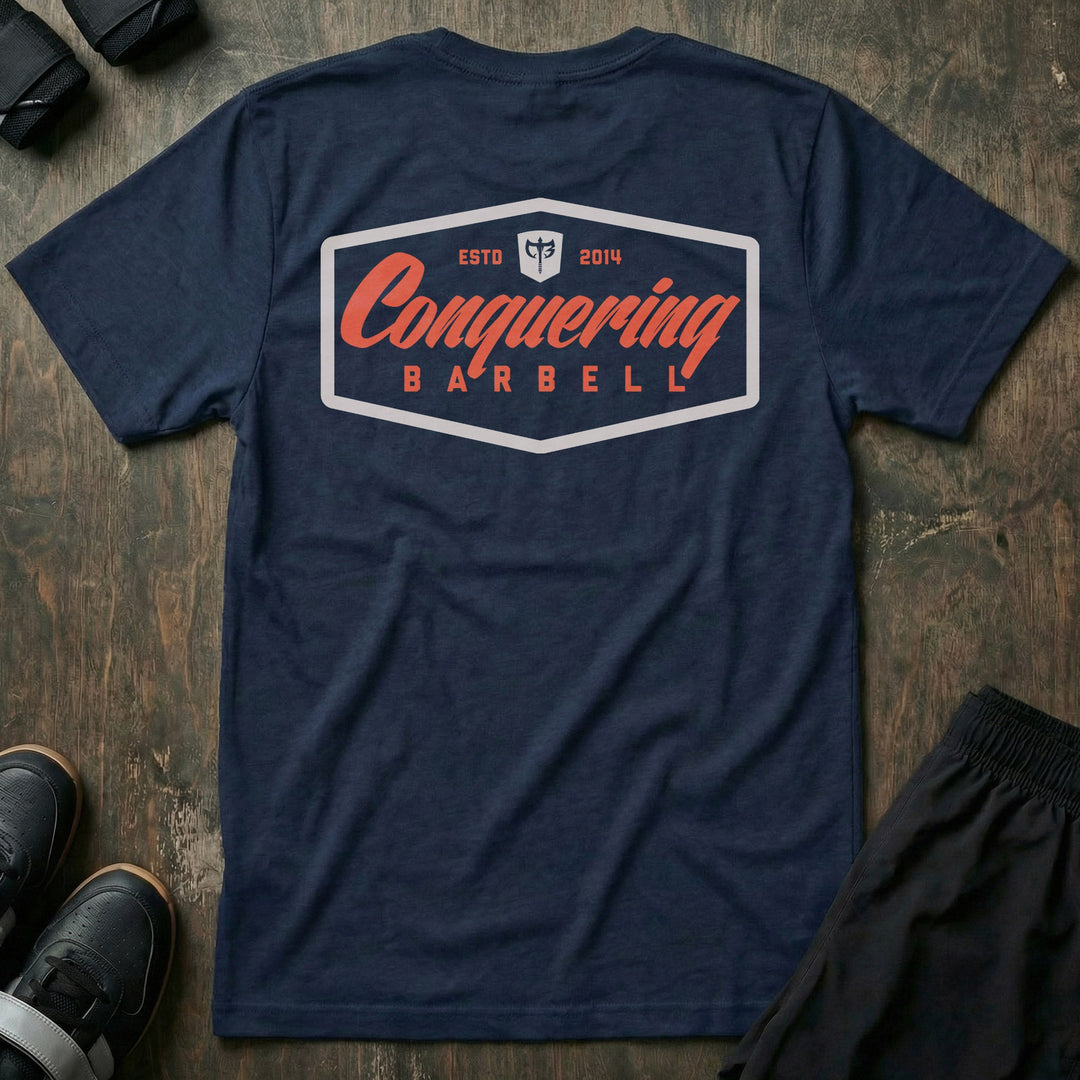 Script Logo Summer Vibes Edition tee in Navy: the classic Conquering Barbell script logo inside a bold badge frame