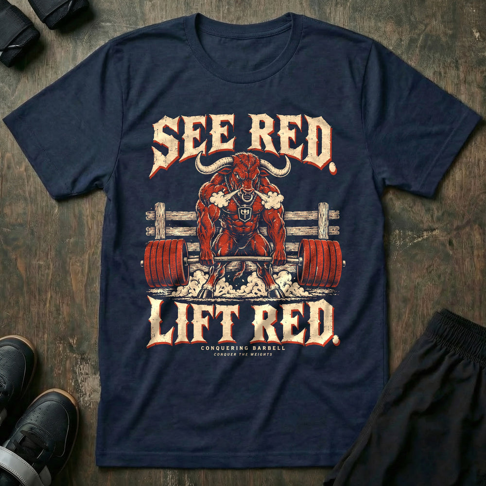 See Red Lift Red - Tee front graphic in Navy with a red bull snorting steam and deadlifting a barbell loaded with red plates - Conquering Barbell