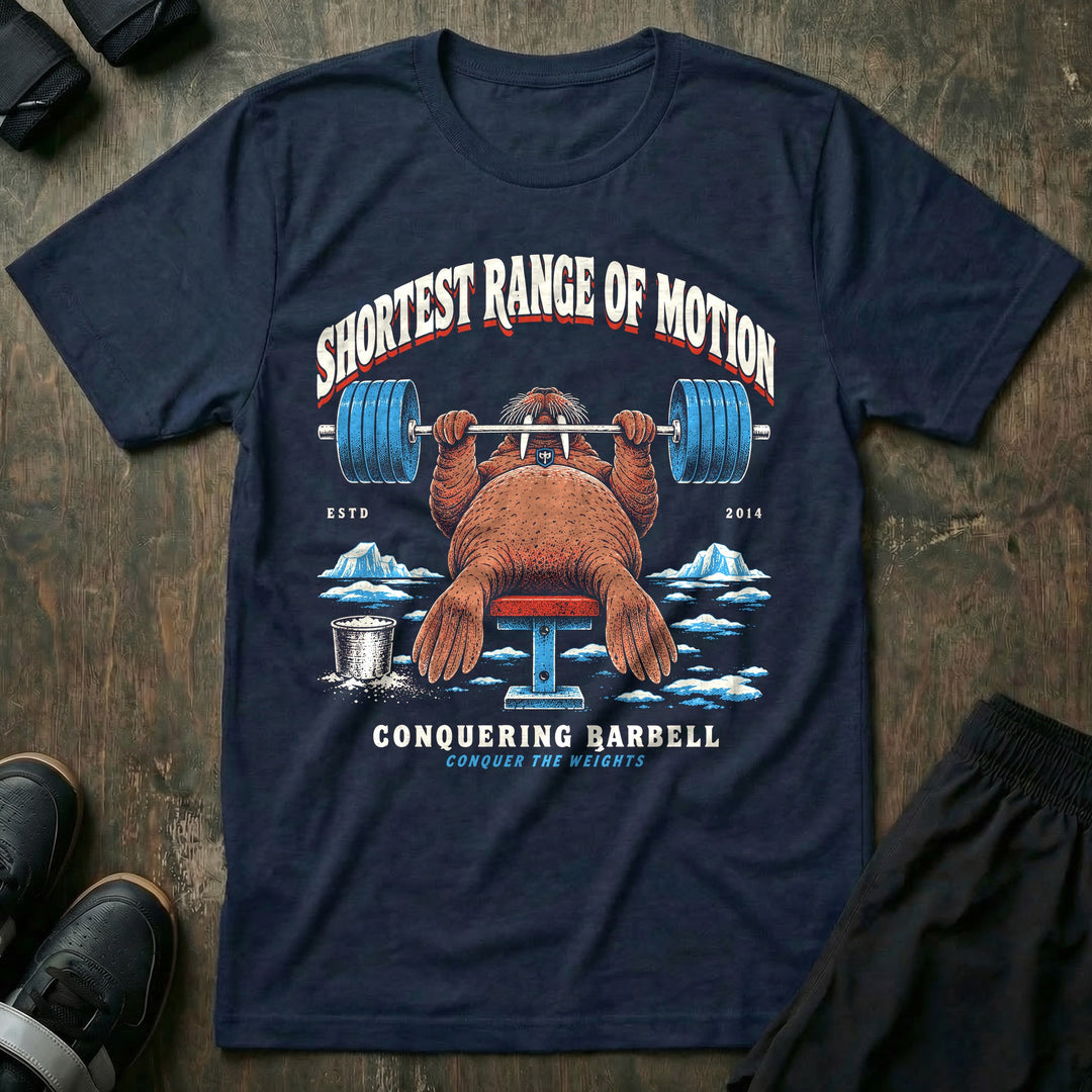 Shortest Range of Motion - Tee front graphic in Navy with a walrus bench pressing a loaded barbell with short flippers on the ice - Conquering Barbell