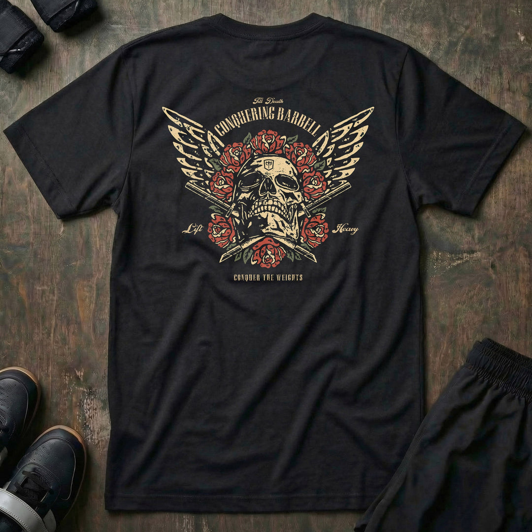 Skull &amp; Roses tee in Black: a winged skull crowned in traditional red roses above crossed barbell sleeves