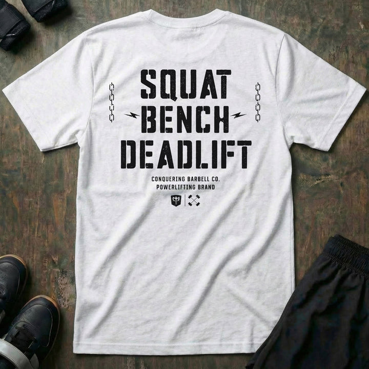 Squat Bench Deadlift Chains tee in White: SQUAT BENCH DEADLIFT in oversized distressed block lettering stacked down the back