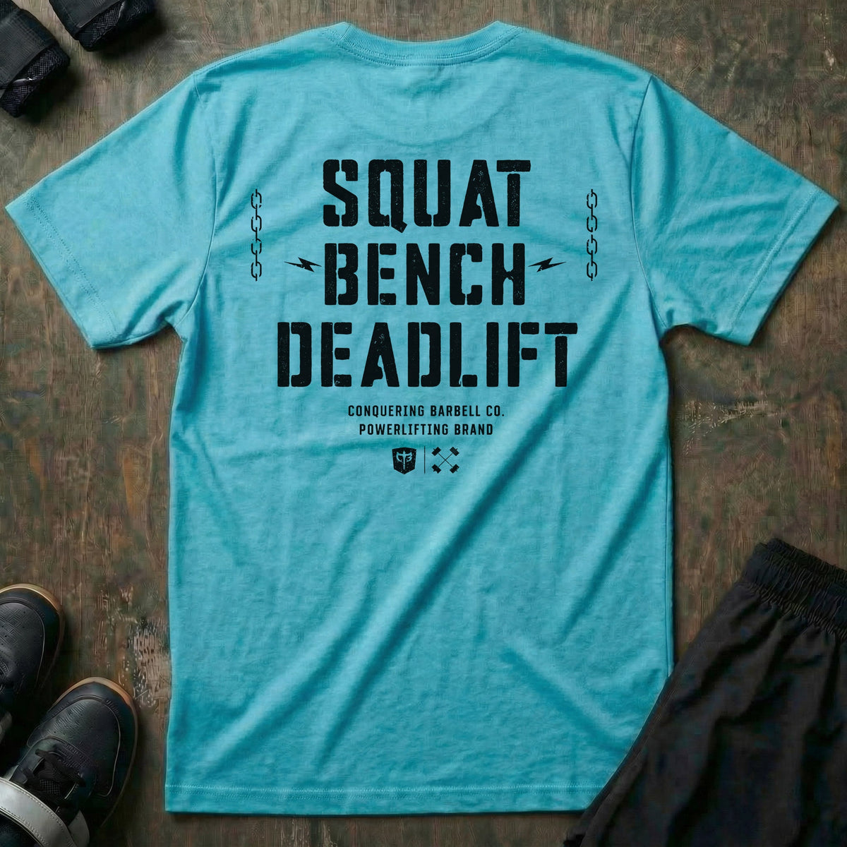 Squat Bench Deadlift Chains tee in Tahiti: SQUAT BENCH DEADLIFT in oversized distressed block lettering stacked down the back