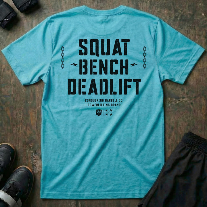 Squat Bench Deadlift Chains tee in Tahiti: SQUAT BENCH DEADLIFT in oversized distressed block lettering stacked down the back
