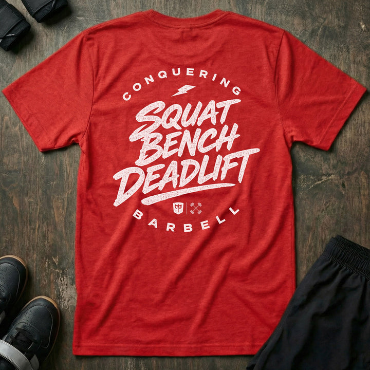 Squat Bench Deadlift Lightning tee in Red: SQUAT BENCH DEADLIFT in bold brush-style lettering stacked down the back