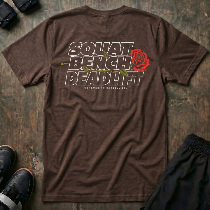 Squat Bench Deadlift Rose tee in Expresso: SQUAT BENCH DEADLIFT stacked in bold outlined block lettering across the back