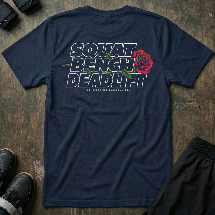Squat Bench Deadlift Rose tee in Navy: SQUAT BENCH DEADLIFT stacked in bold outlined block lettering across the back