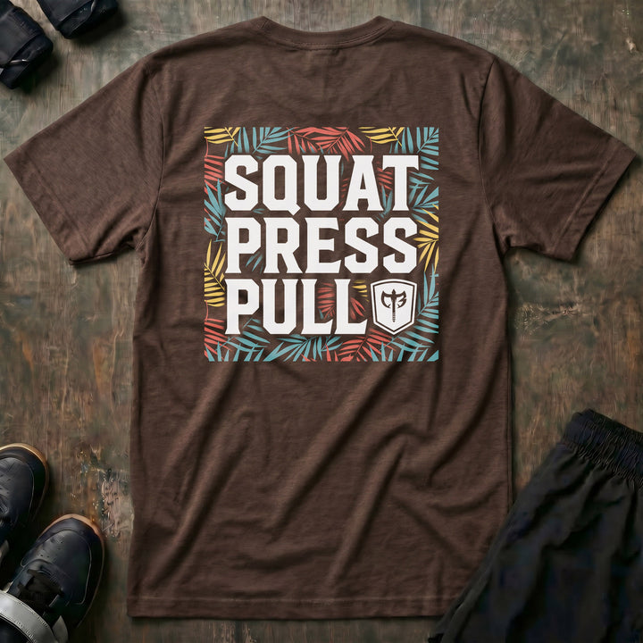 Squat Press Pull Tropical tee in Expresso: SQUAT PRESS PULL stacked in bold white block letters with the CB shield