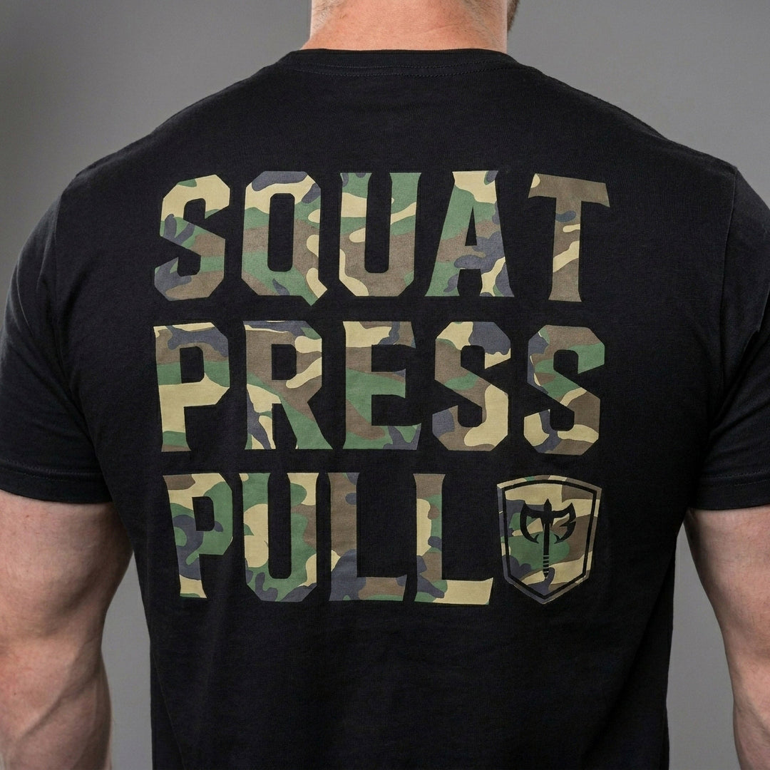 Squat Press Pull® tee in Black: SQUAT PRESS PULL in oversized woodland camo lettering stacked down the back