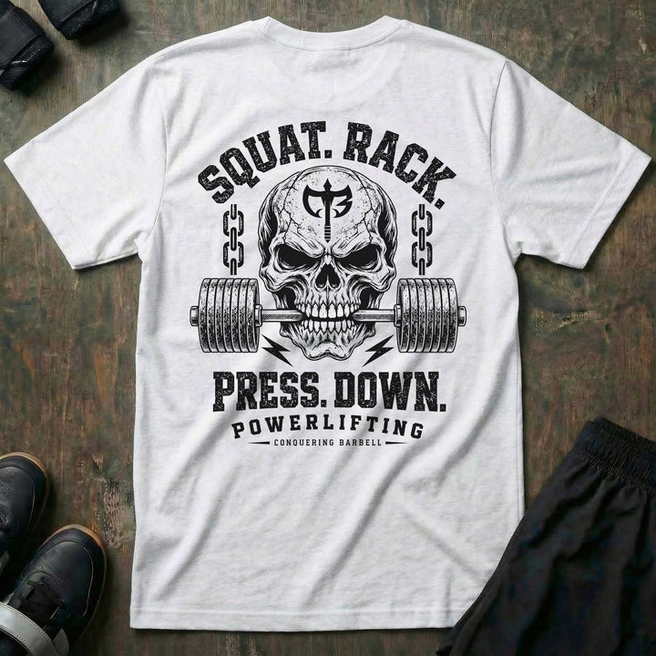 Squat. Rack. Press. Down. tee in White: a skull with the CB shield biting down on a barbell between chains