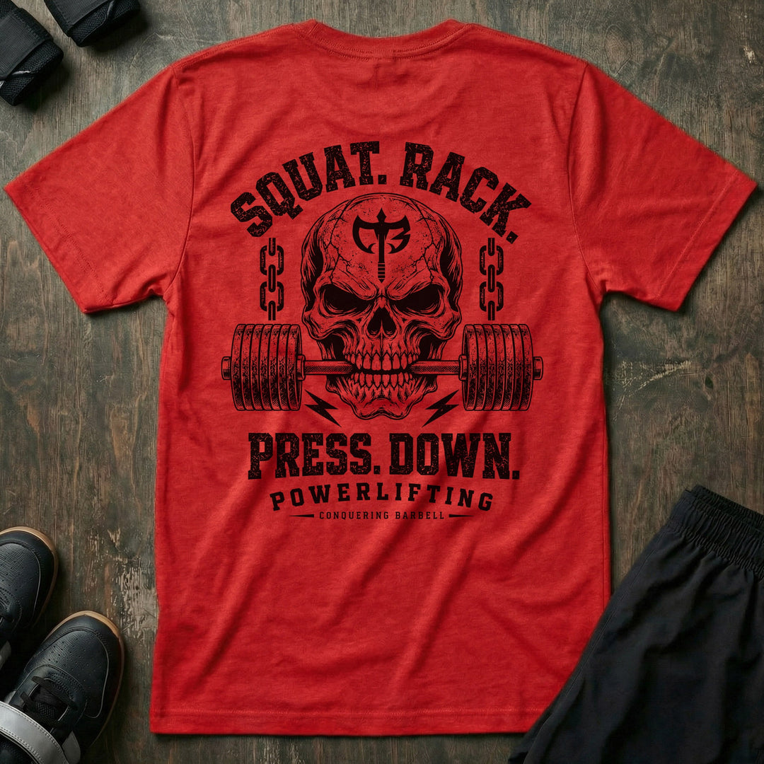 Squat. Rack. Press. Down. tee in Red: a skull with the CB shield biting down on a barbell between chains