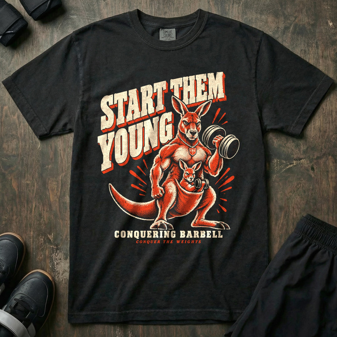 Start Them Young - Relaxed Fit Tee front graphic in Black with a muscular kangaroo curling a dumbbell while the joey in the pouch curls a tiny one - Conquering Barbell