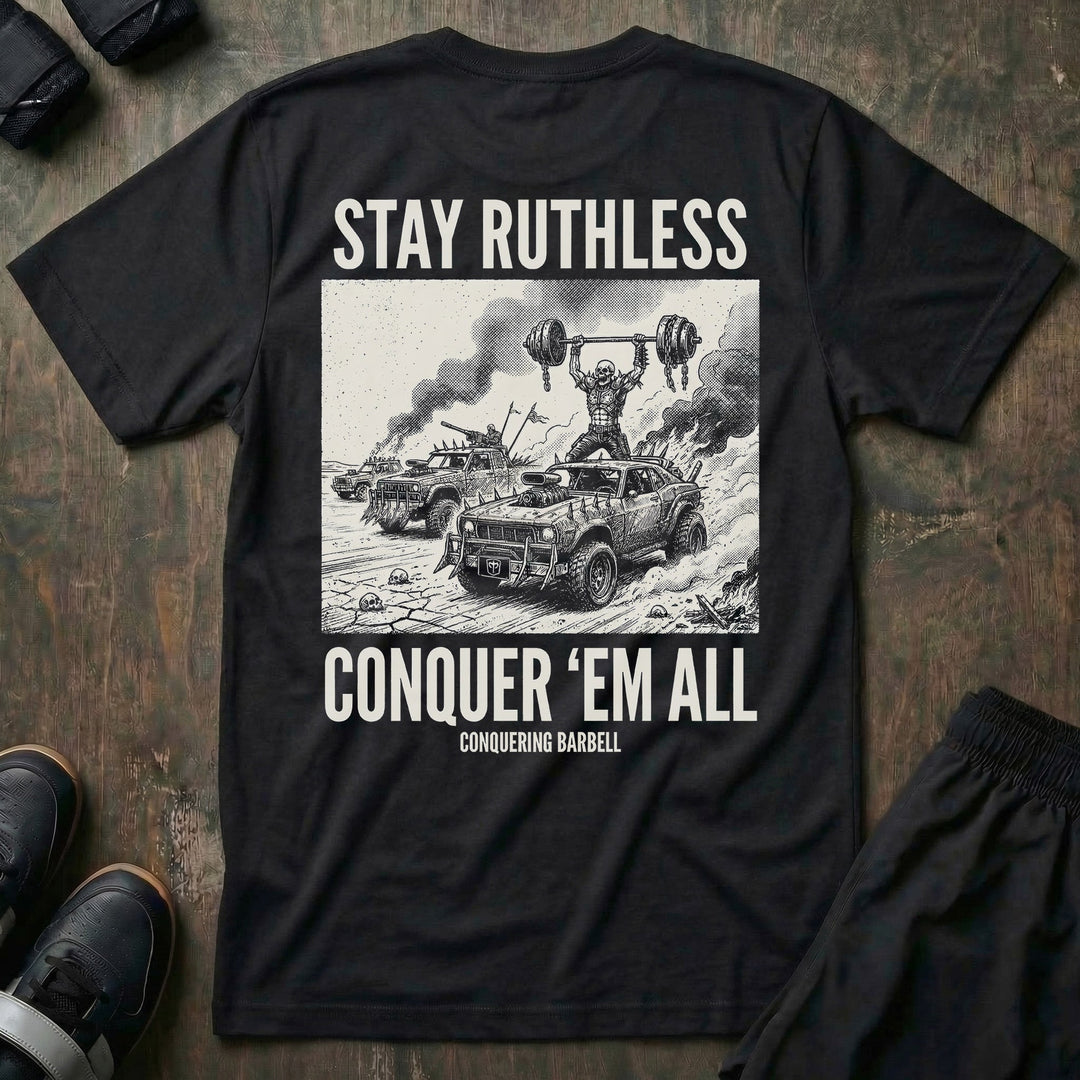 Stay Ruthless tee in Black: a skeleton warrior pressing a massive barbell overhead atop a war rig