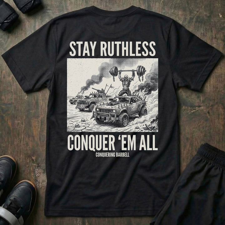 Stay Ruthless tee in Black: a skeleton warrior pressing a massive barbell overhead atop a war rig