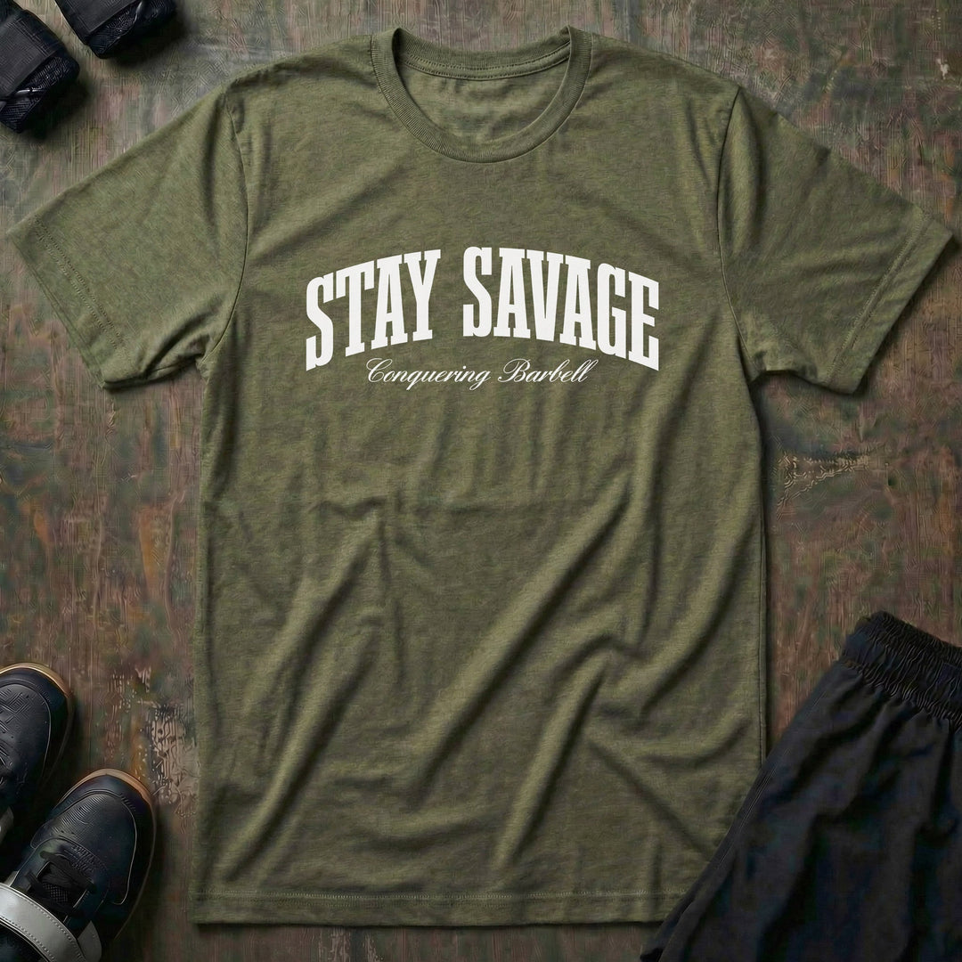 Stay Savage tee in Military: STAY SAVAGE in bold arched collegiate letters with Conquering Barbell script below