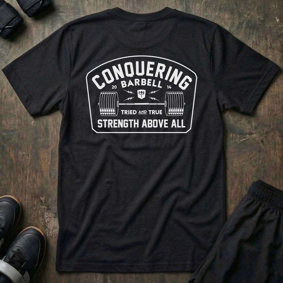 Strength Above All -Badge tee in Black: a vintage-style badge