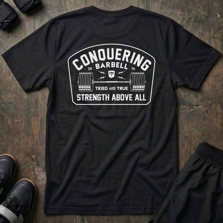 Strength Above All -Badge tee in Black: a vintage-style badge