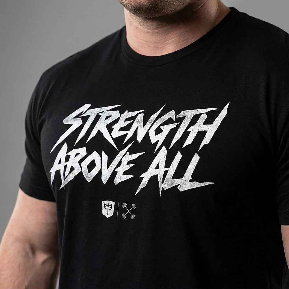 Strength Above All V2 tee in Black: STRENGTH ABOVE ALL in raw white brush lettering with small CB marks below