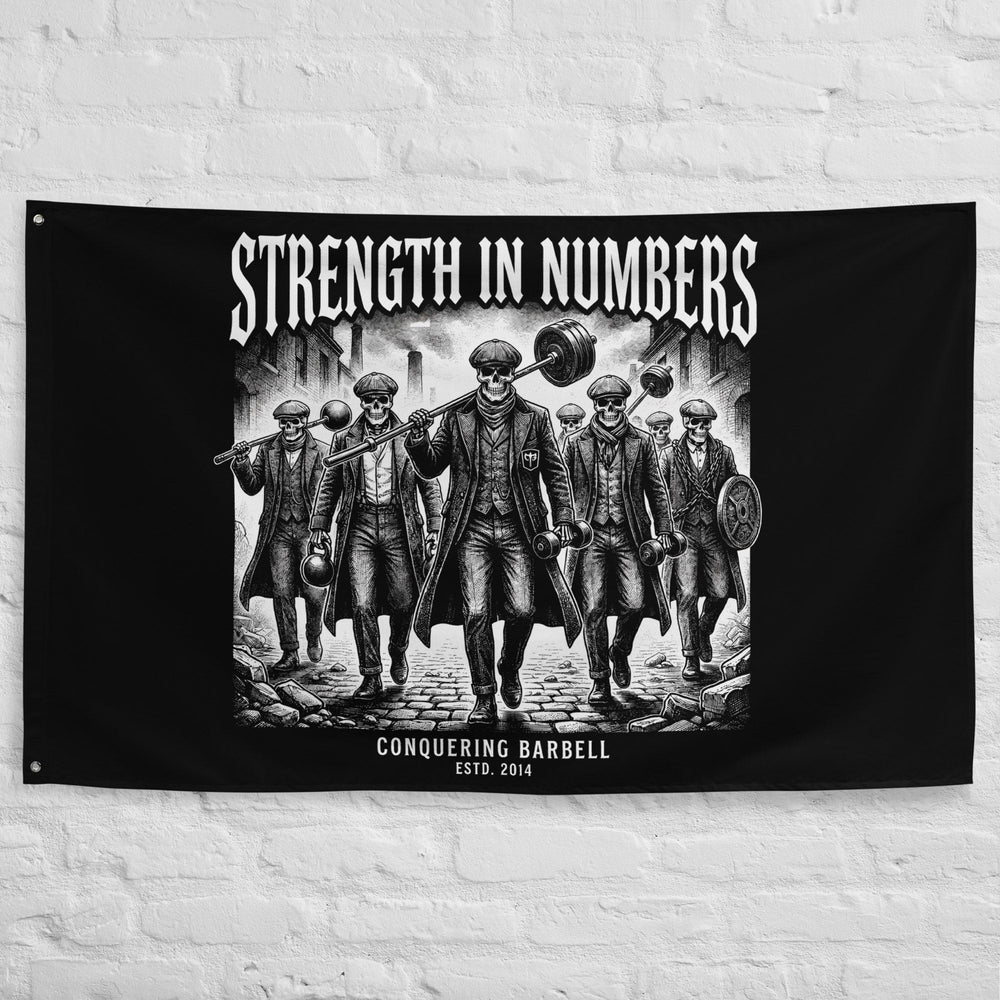 Strength in Numbers - Polyester Flag, horizontal gym flag hanging in a home gym - Conquering Barbell