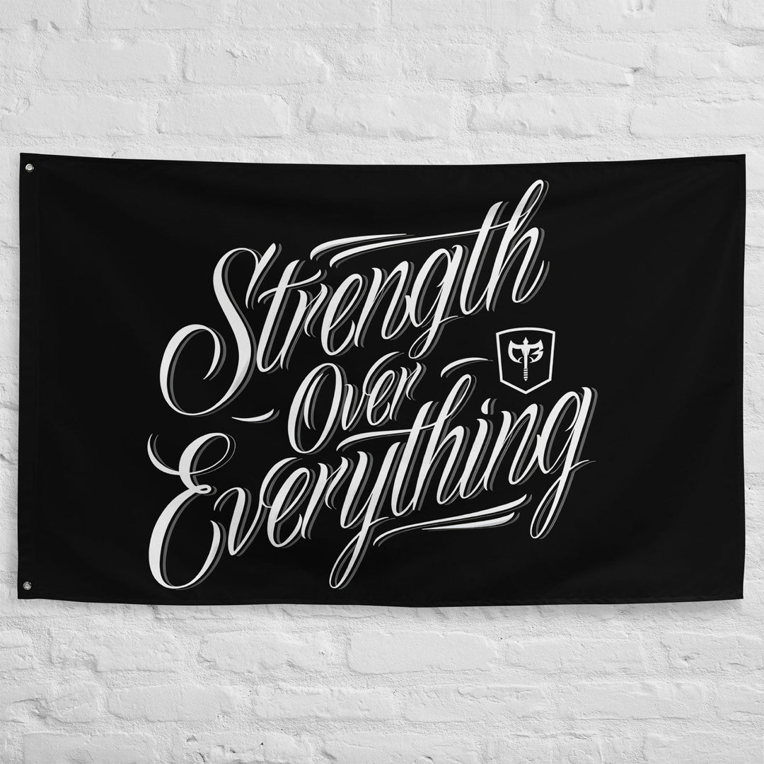 Strength Over Everything - Polyester Flag, horizontal gym flag hanging in a home gym - Conquering Barbell