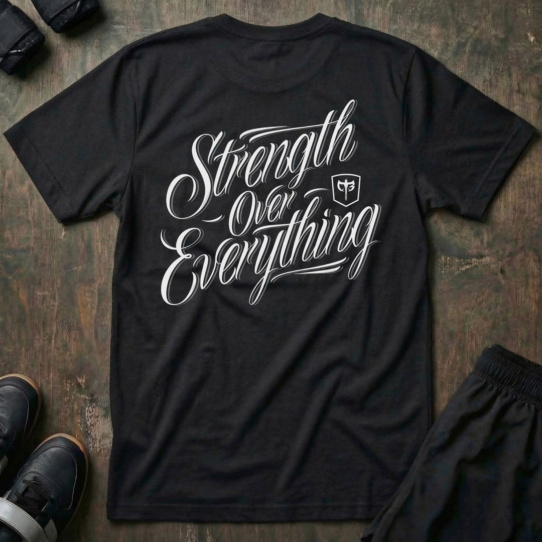 Strength Over Everything tee in Black: Strength Over Everything in sweeping white script with the CB shield across the back