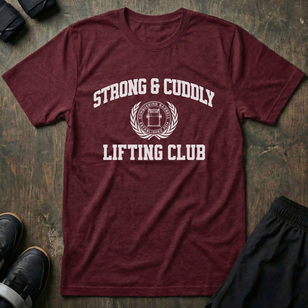 Strong & Cuddly Lifting Club tee in Cardinal: STRONG & CUDDLY arched in collegiate letters over a laurel wreath crest