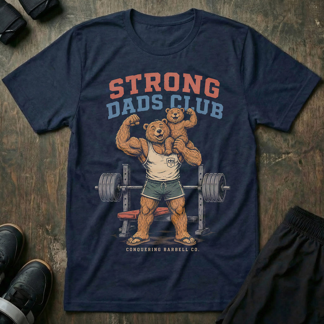 Strong Dads Club tee in Navy: a jacked papa bear in a CB tank top and flip flops grinning