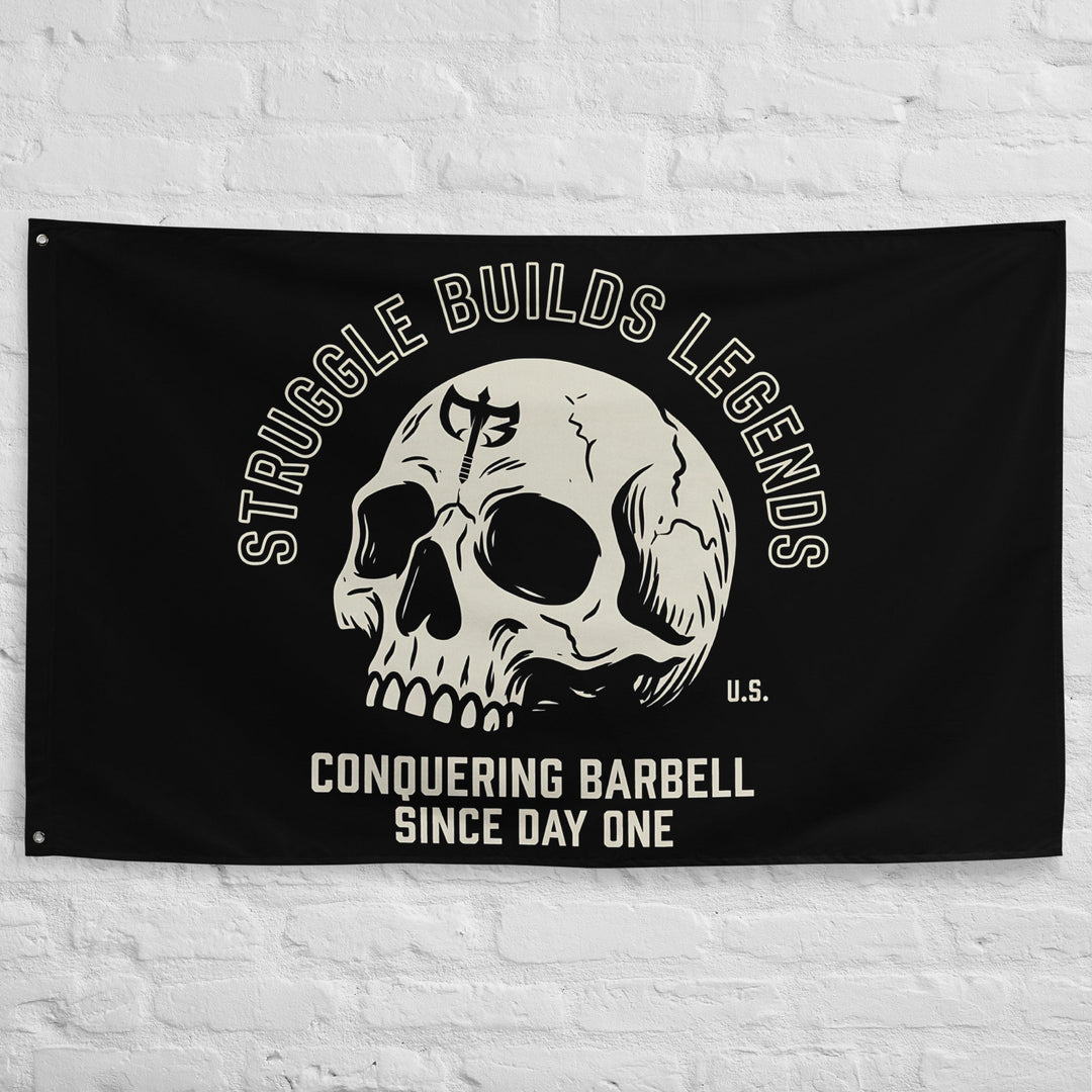 Struggle Builds Legends - Polyester Flag, horizontal gym flag hanging in a home gym - Conquering Barbell
