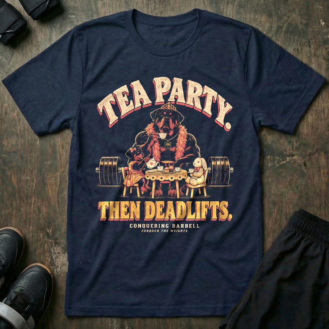 Tea Party. Then Deadlifts - Tee front graphic in Navy with a rottweiler dad wearing a tiara and pink feather boa drinking tea with his daughter and a stuffed bunny in front of a loaded barbell - Conquering Barbell