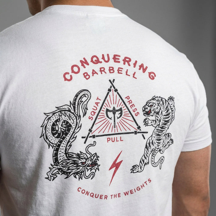The Balance of Power tee in White: a dragon and a tiger flanking a triangle of the three lifts
