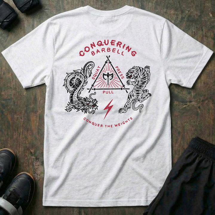The Balance of Power tee in White: a dragon and a tiger flanking a triangle of the three lifts