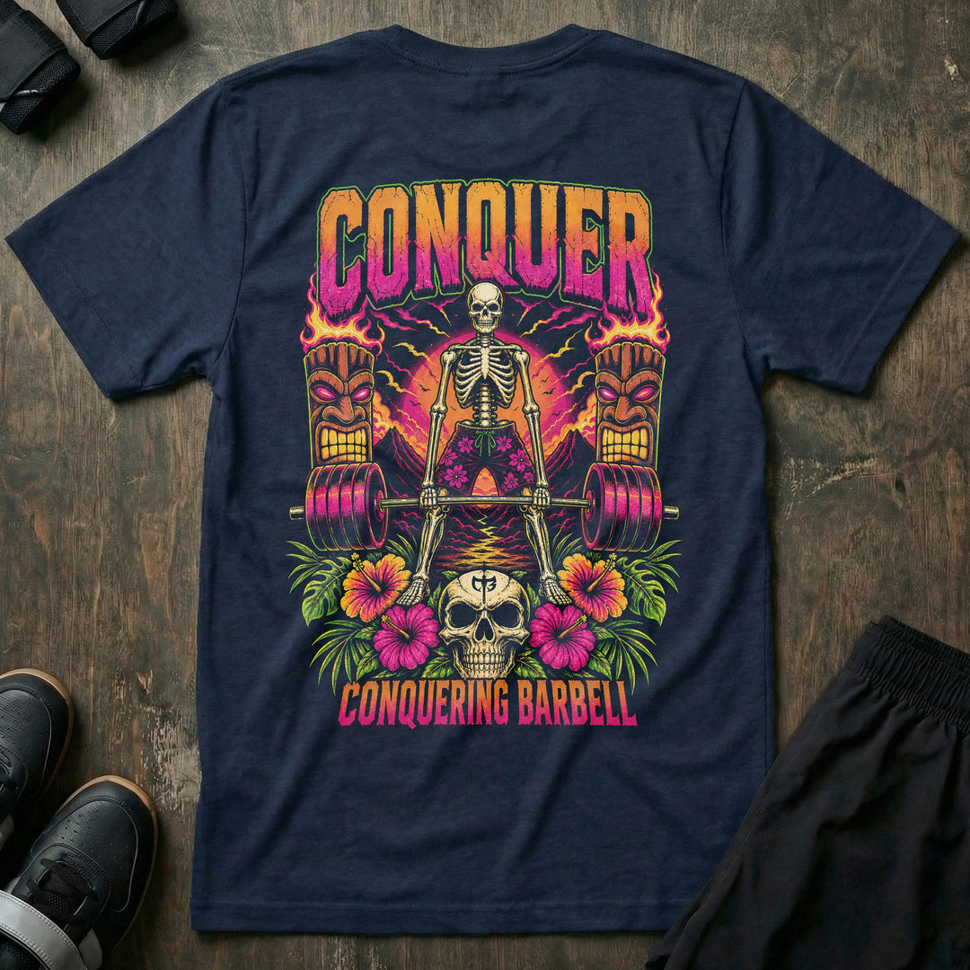 Tiki Power tee in Navy: a skeleton deadlifting a loaded barbell between two flaming tiki torches against a tropical sunset