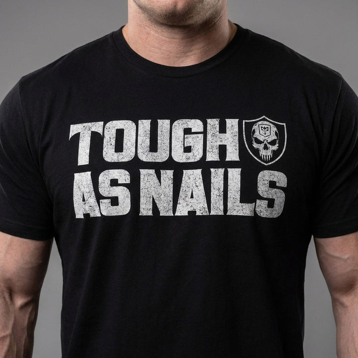Tough as Nails tee in Black: TOUGH AS NAILS in bold distressed block letters beside a skull shield