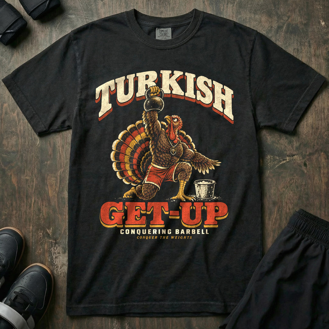 Turkish Get-Up - Relaxed Fit Tee front graphic in Black with a turkey doing a Turkish get-up with a kettlebell locked out overhead - Conquering Barbell