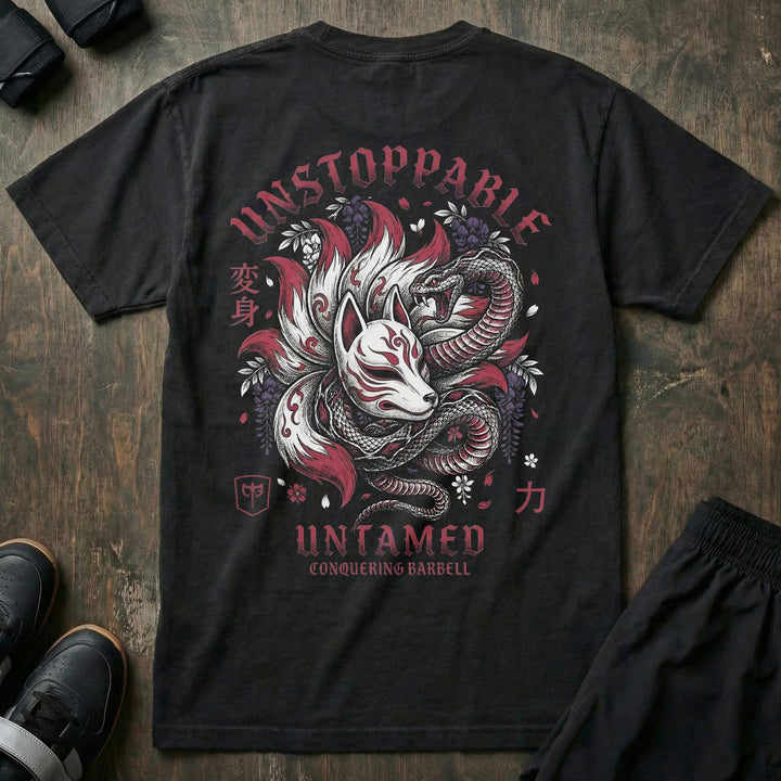 Unstoppable and Untamed relaxed fit tee in Black: a fierce kitsune fox spirit with serpent coiled around it