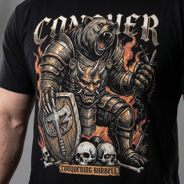 War Bear tee in Black: an armored grizzly warrior with a demon mask on his chest plate and a CB shield in hand