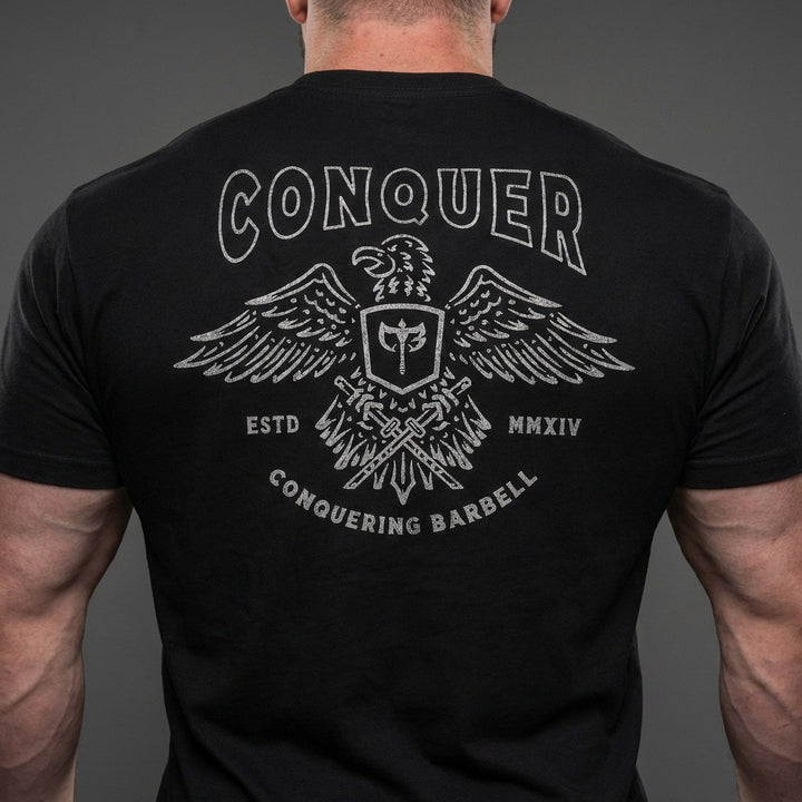 Talons Out tee in Black: an eagle with spread wings and the CB shield crest over crossed barbells