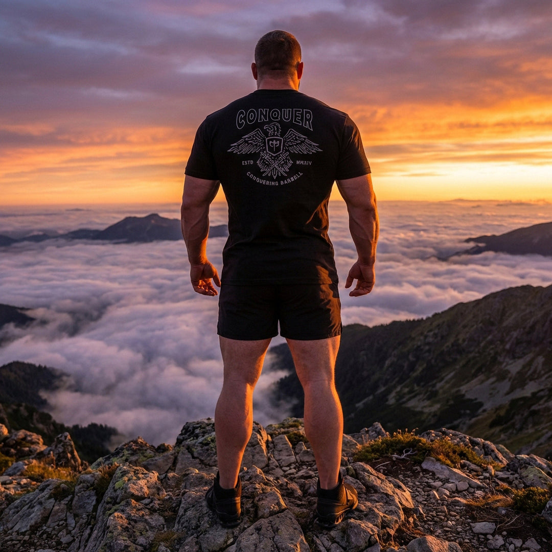 Talons Out tee in Black: an eagle with spread wings and the CB shield crest over crossed barbells